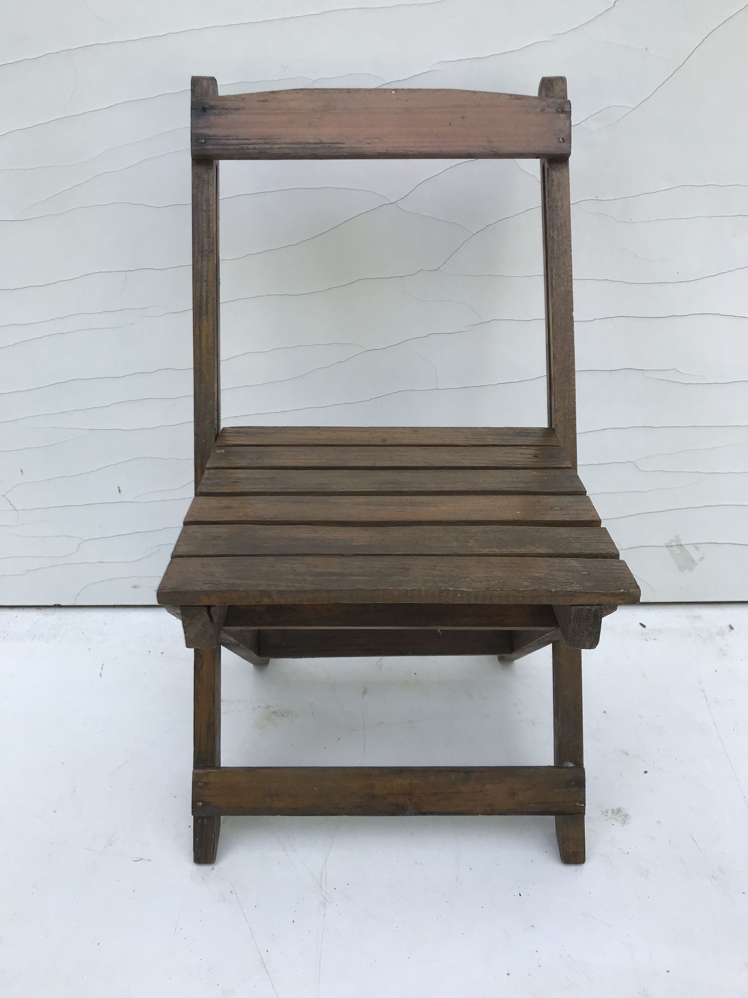 Old folding chair child in wood