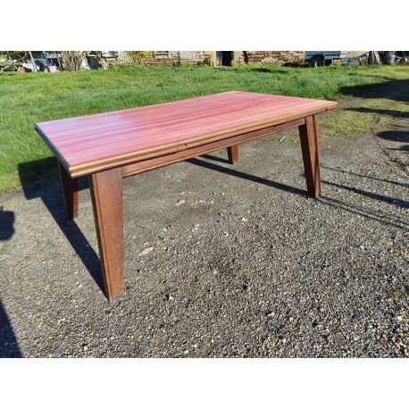 1960s oak dining table with integrated extensions.