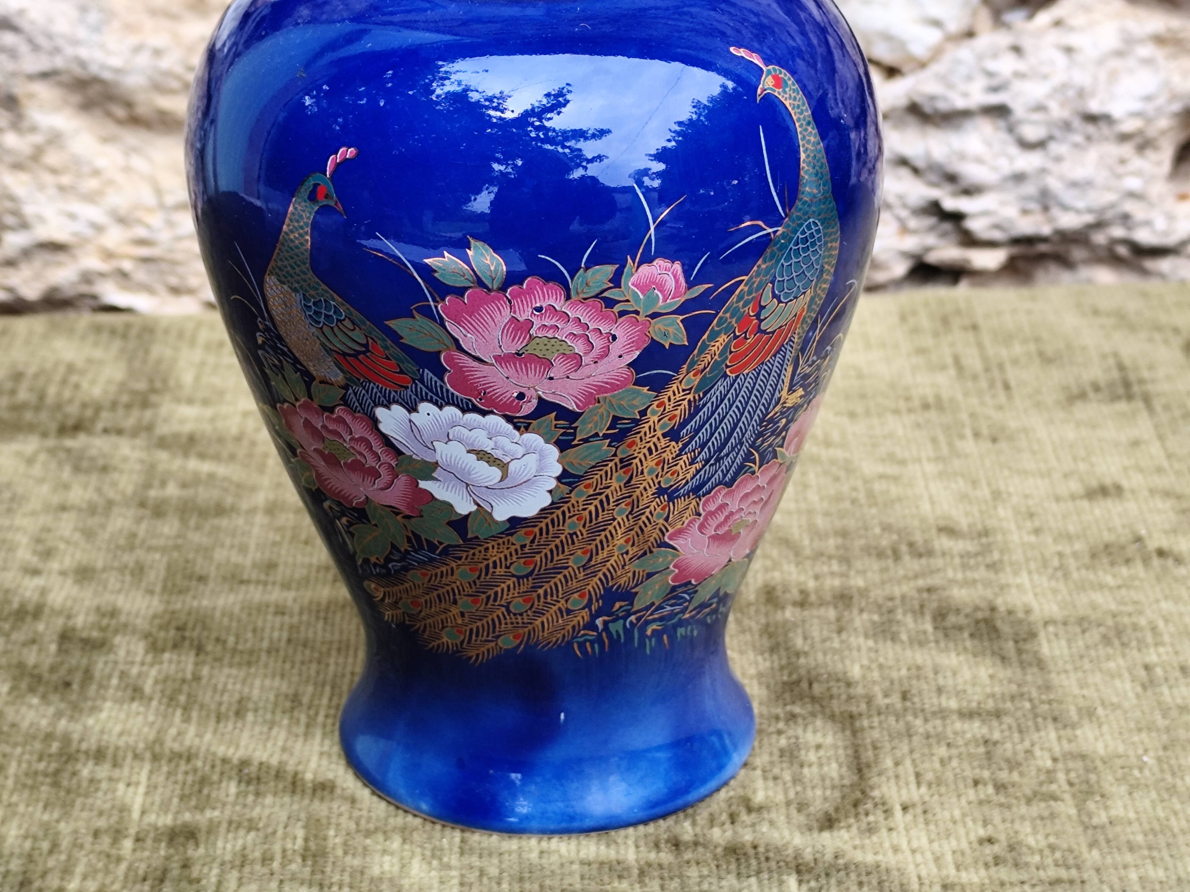 Peacock ceramic vase