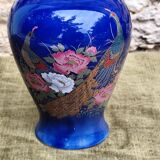 Peacock ceramic vase
