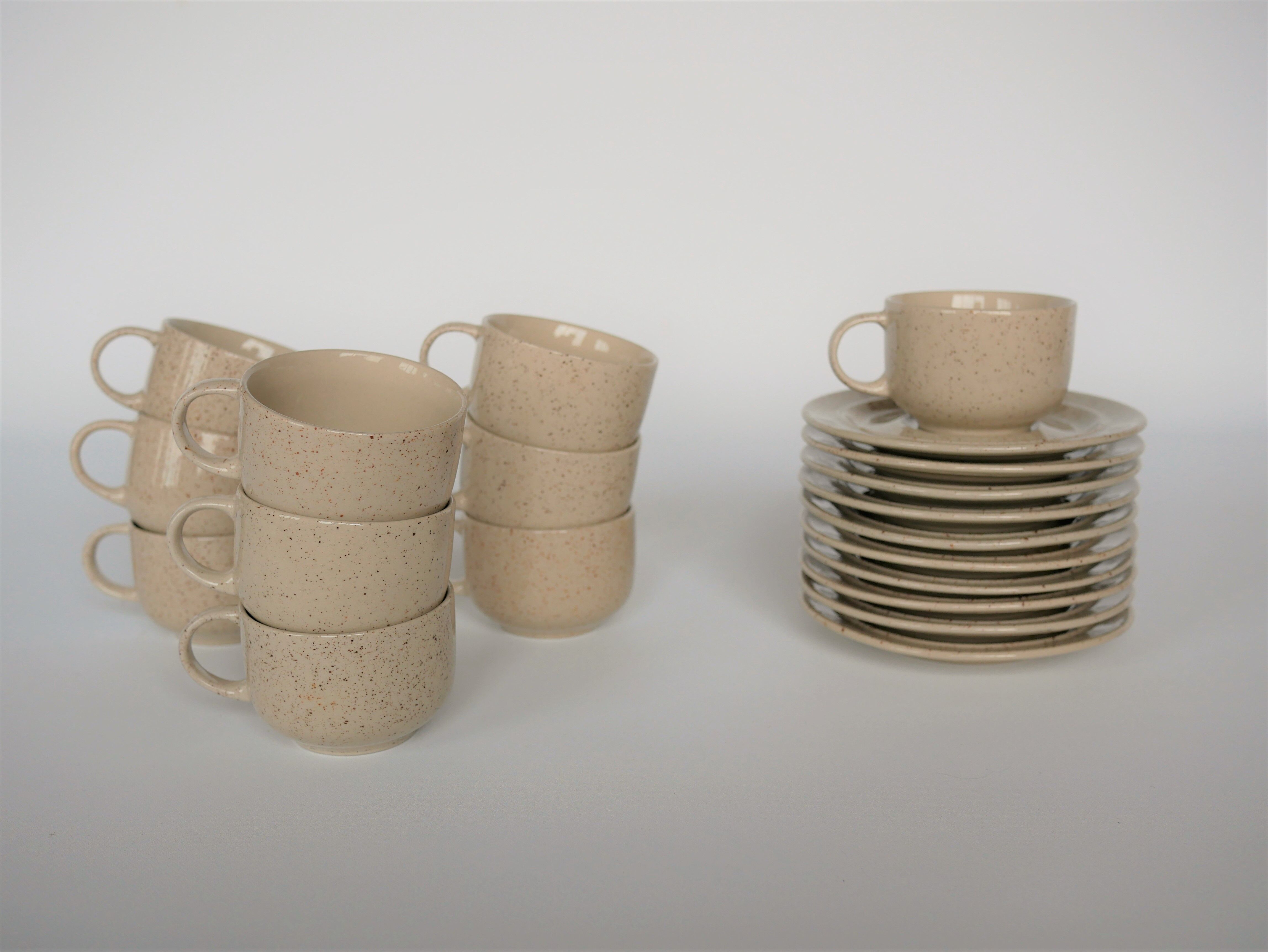 Coffee cup and vintage pyrity sandstone subcup