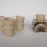 Coffee cup and vintage pyrity sandstone subcup