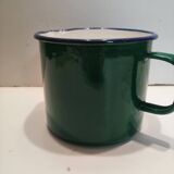 Old milk pitcher in enamelled sheet metal