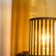 Pair of black metal wall lamps with yellow shades and inner diffuser