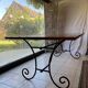 Large table with wrought iron legs