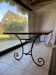 Large table with wrought iron legs