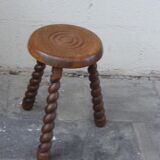 Stool in old oak, turned feet and chiseled grounds