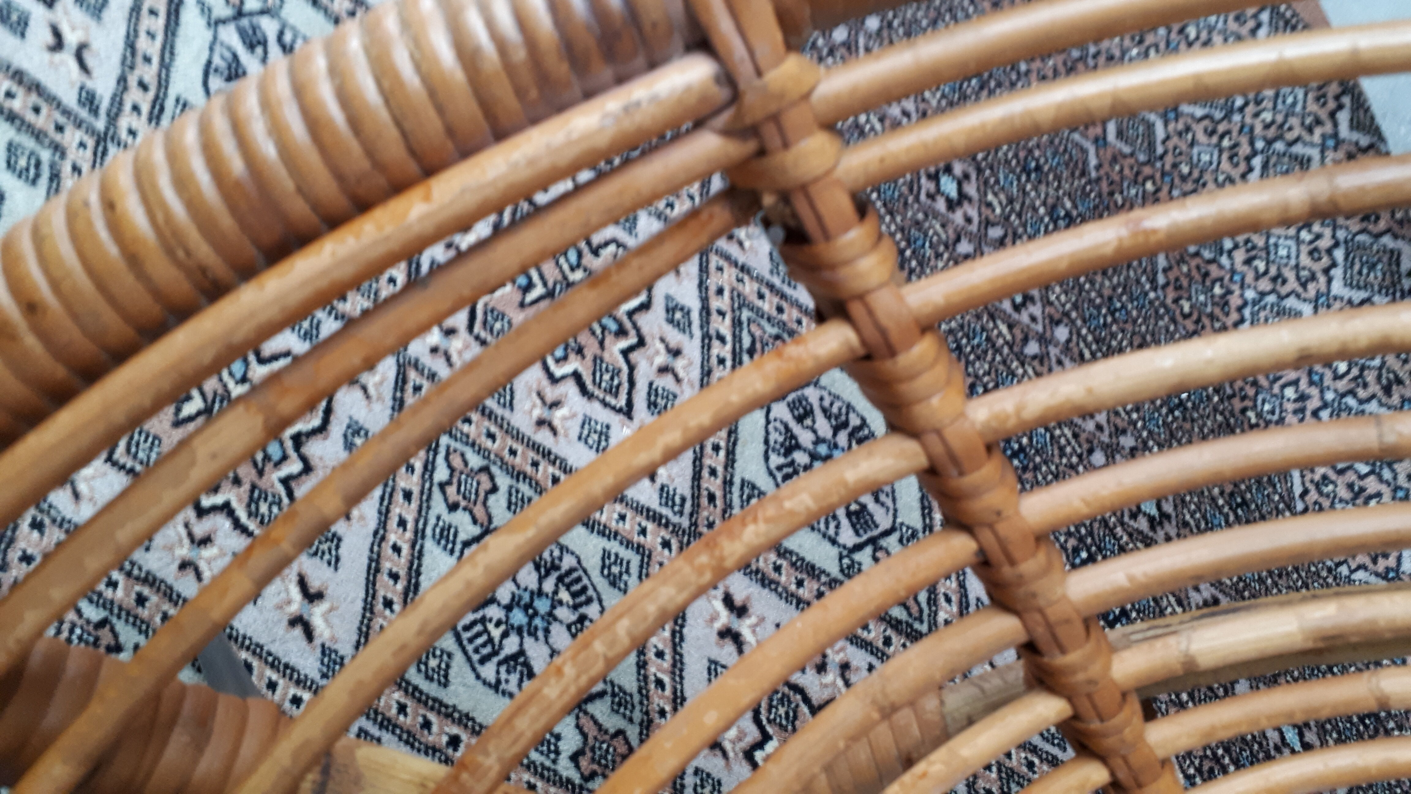 Set of armchairs "soleil" and rattan table of the years 50