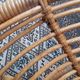 Set of armchairs "soleil" and rattan table of the years 50