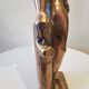 Large kerosene lamp mounted on bronze statue. Late nineteenth century