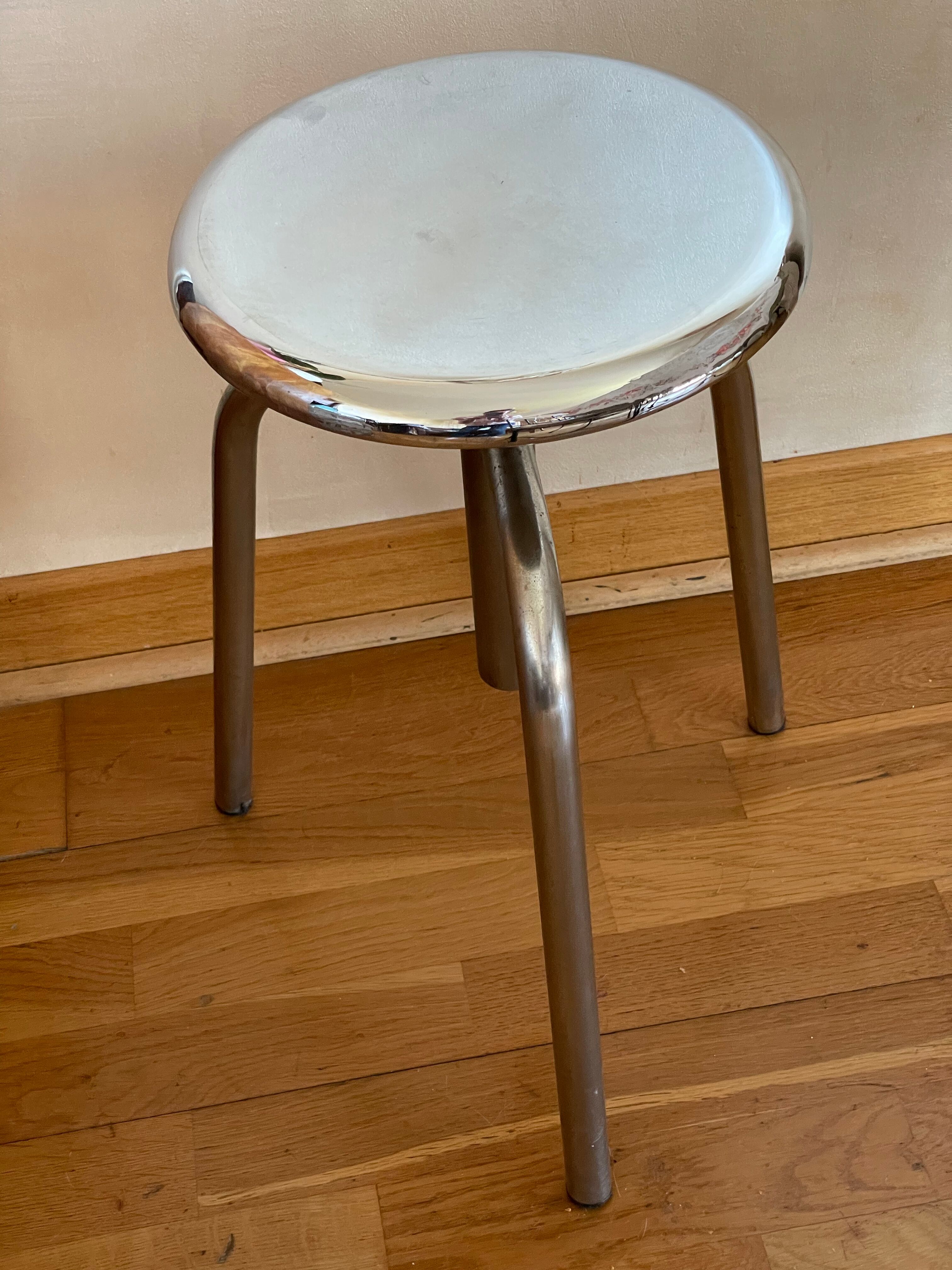 Chrome screw stool of hairdresser workshop