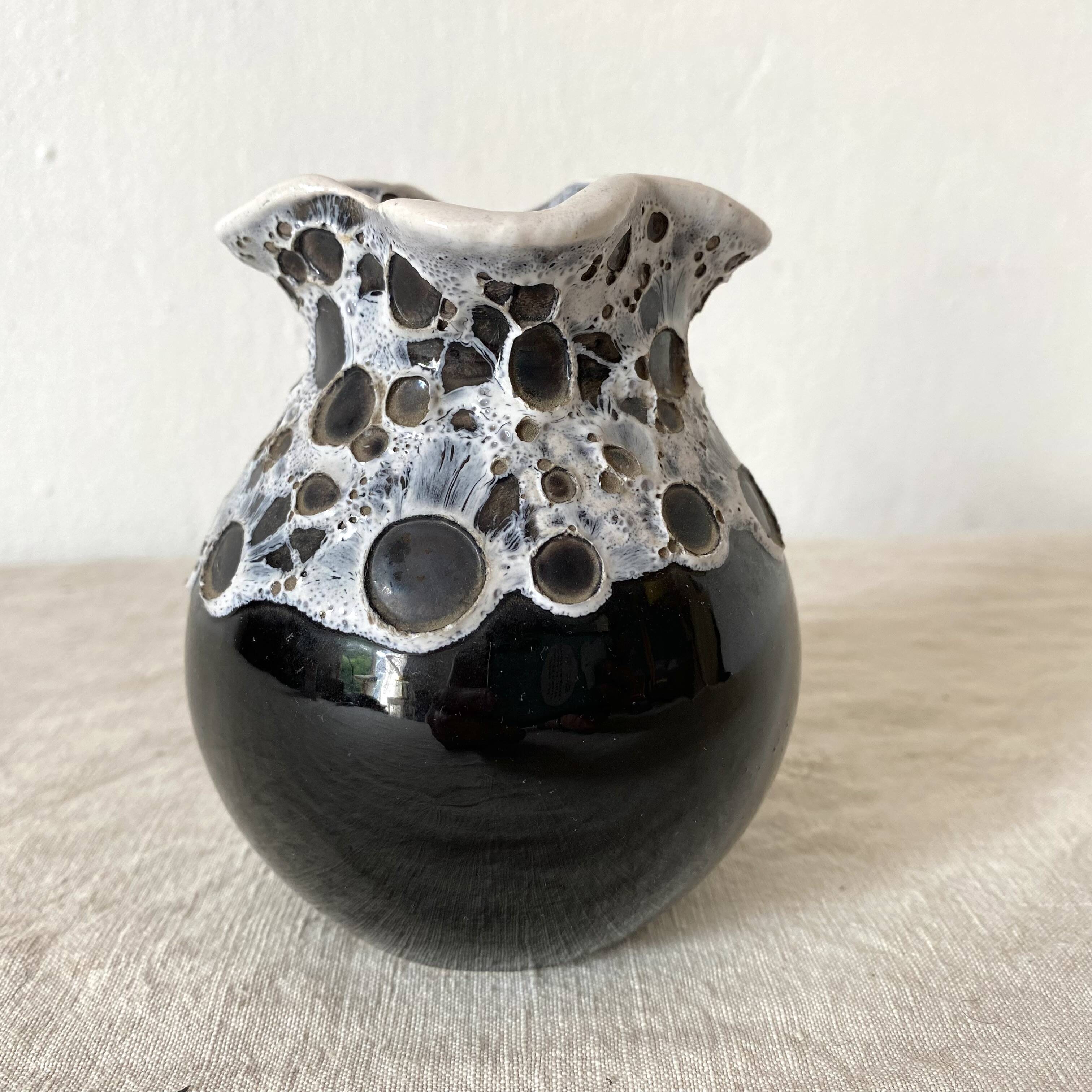 Vintage black and white Savoyard enamel vase