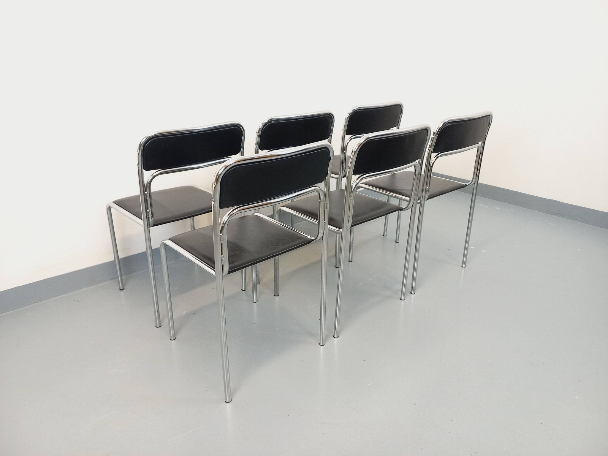 Set of 6 vintage Italian stackable chairs in chrome metal and skai.
