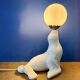 Vintage seal lamp in white ceramic and opaline.