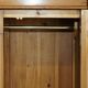 Vintage hand-carved wardrobe in Art Nouveau style.