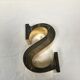 Brass sign letter S