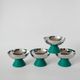 set of 4 large stainless steel bowls and green plastic feet 1970