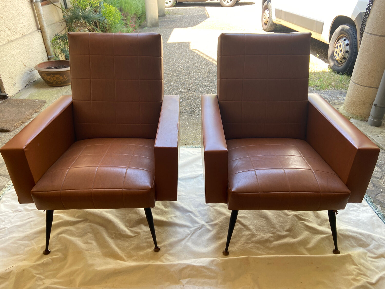 Pair of skaï armchairs