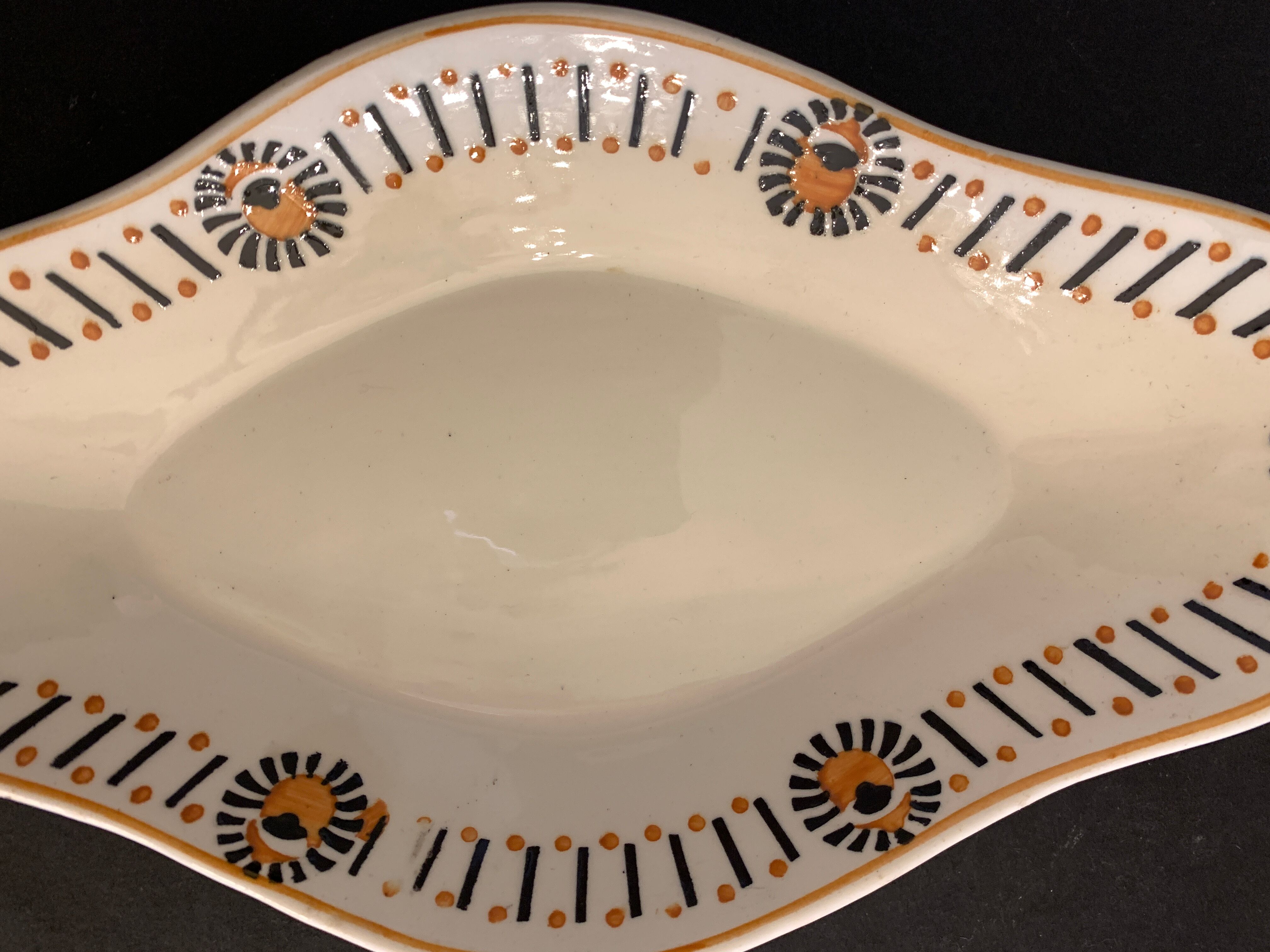 Pair of art deco raviers signed Longwy and numbered, model Gerazine