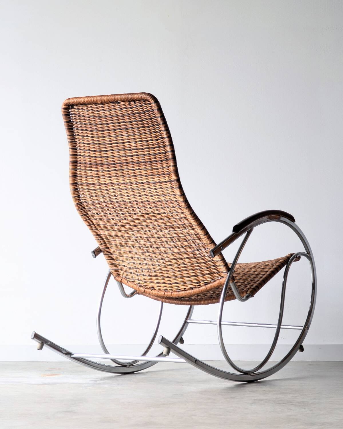 Vintage Thonet rocking chair in chrome and rattan, 1970.
