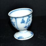 Antique porcelain diabolo egg cup with blue hand-painted onion decoration