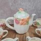 Adorable little vintage tea set in coloured earthenware.