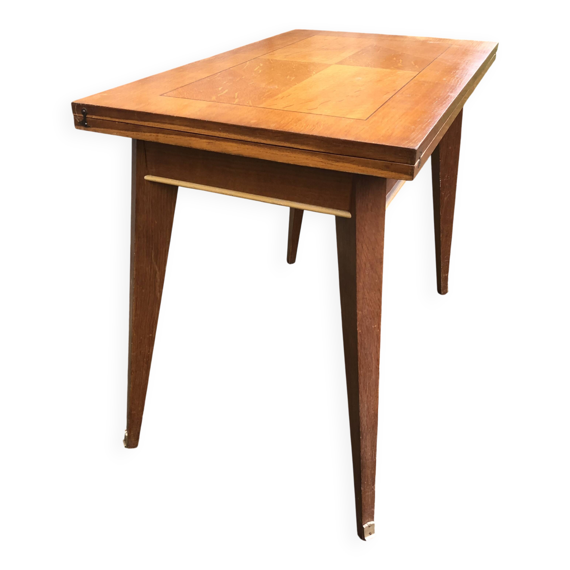 Table vintage portefeuille en chêne aux pieds compas.