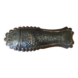 Old cake mold or chocolate fish