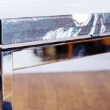 Coffee table in resin and chrome metal