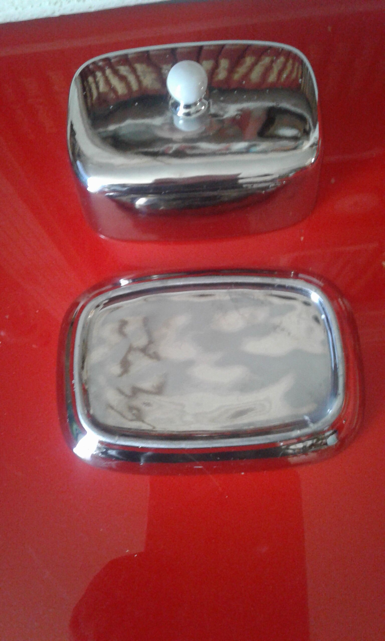 White and silver ceramic butter dish