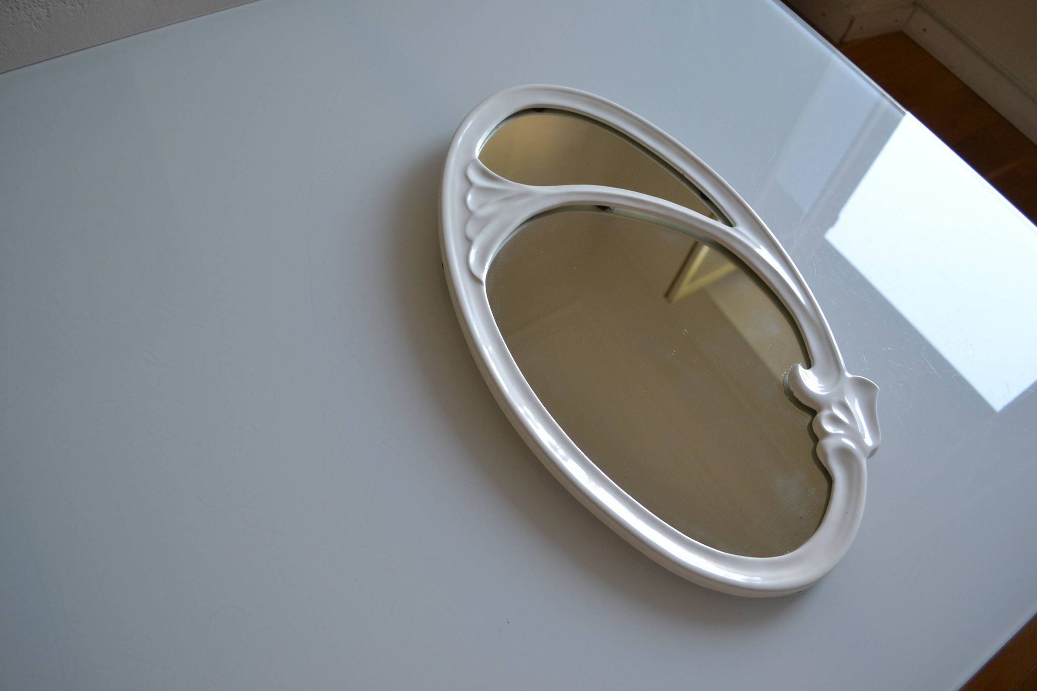 Oval mirror in art nouveau jugendstil style in enamelled cast iron 49 x 29