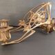 Double candlestick in gilded brass