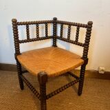 Corner chair in turned wood and straw