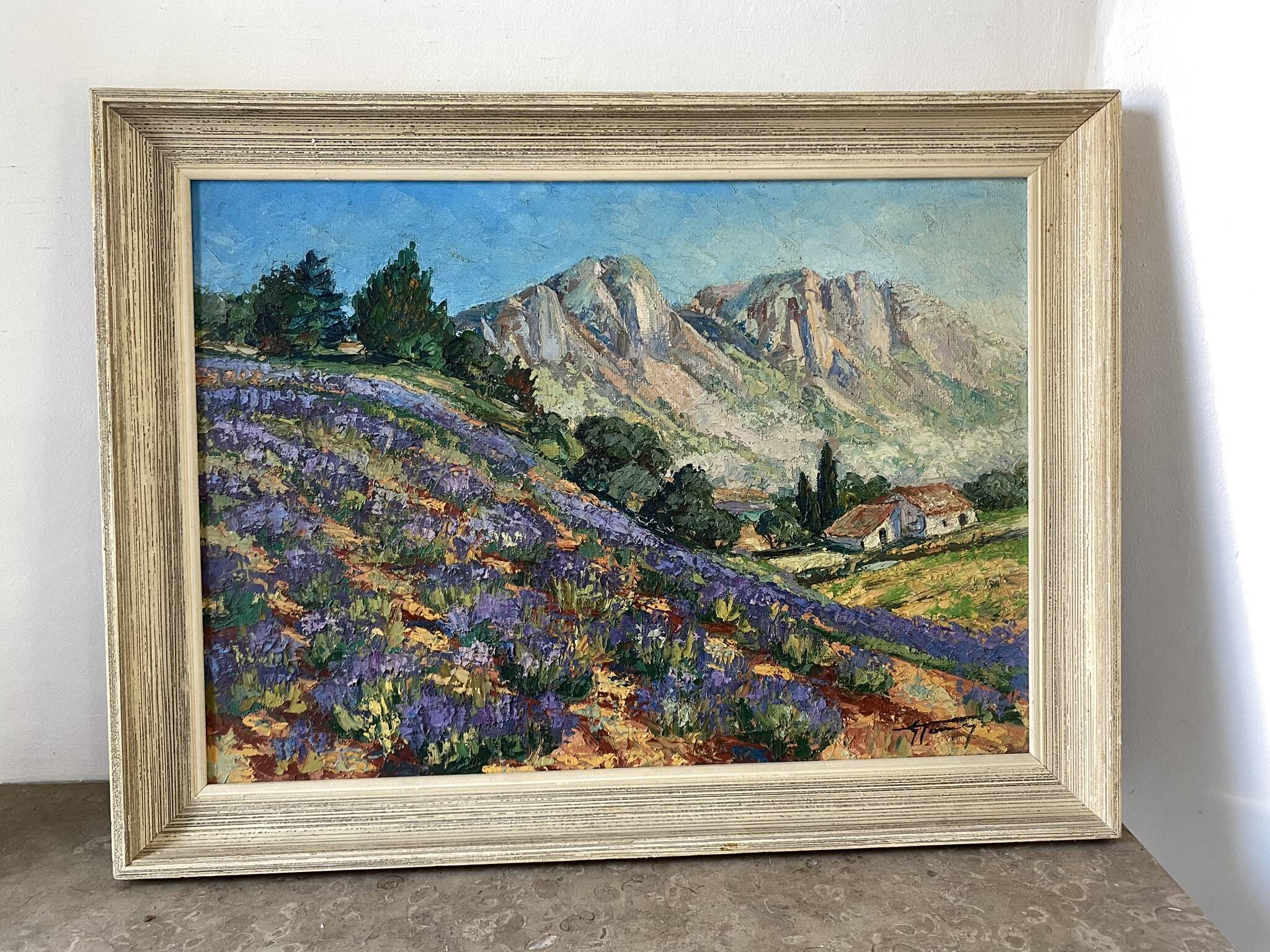 Paysage de montagnes signé