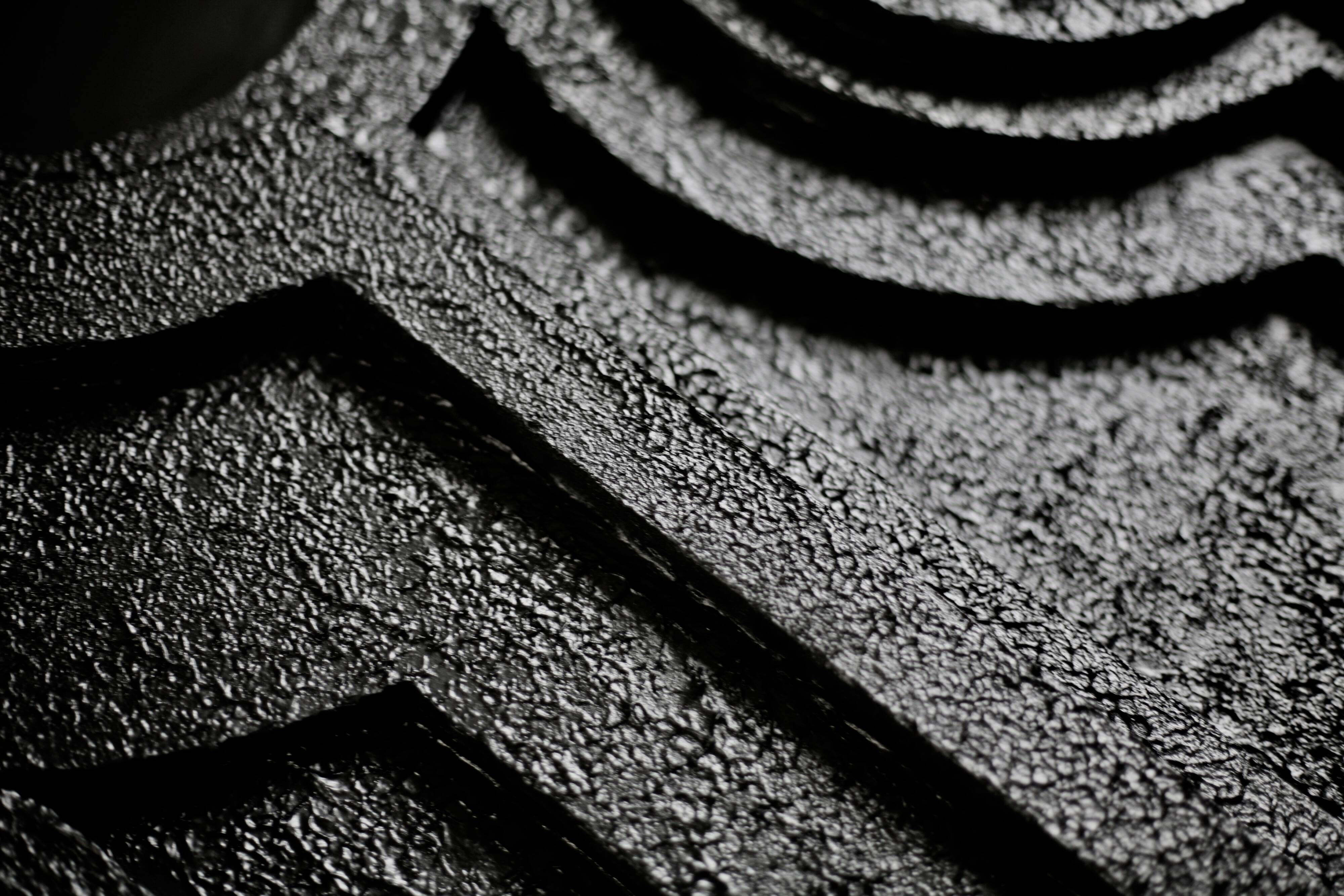 Wall sculpture, wood and black coating, late 1970s