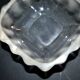 Lalique glass ashtray bowl with frosted finish, engraved with wave design, signed Lalique.