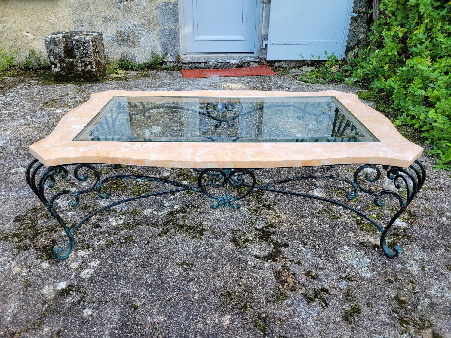 Pink marble and wrought iron coffee table
