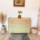 1960s commode with tapered legs.