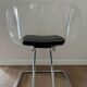 1970s chairs in acrylic and metal designed by Harvey Guzzini.
