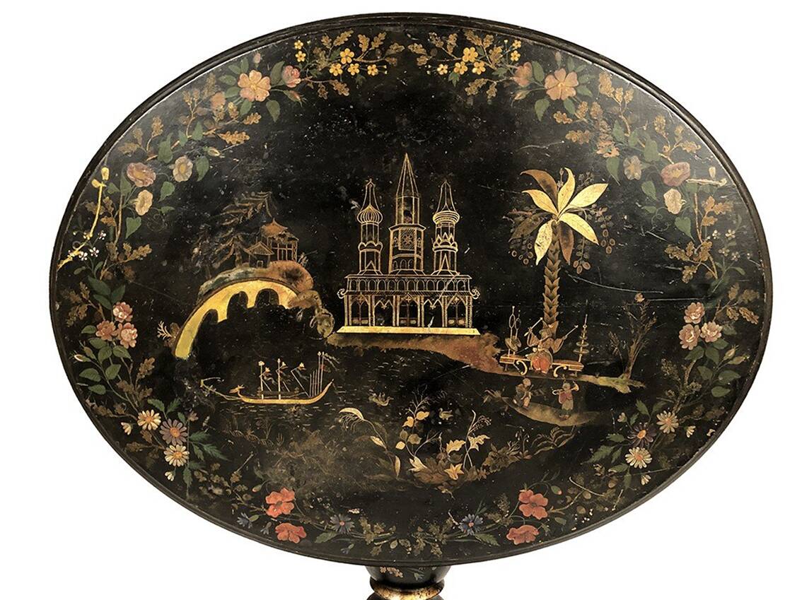 Large tilting pedestal table, black lacquered wood with a lively oriental landscape decoration.