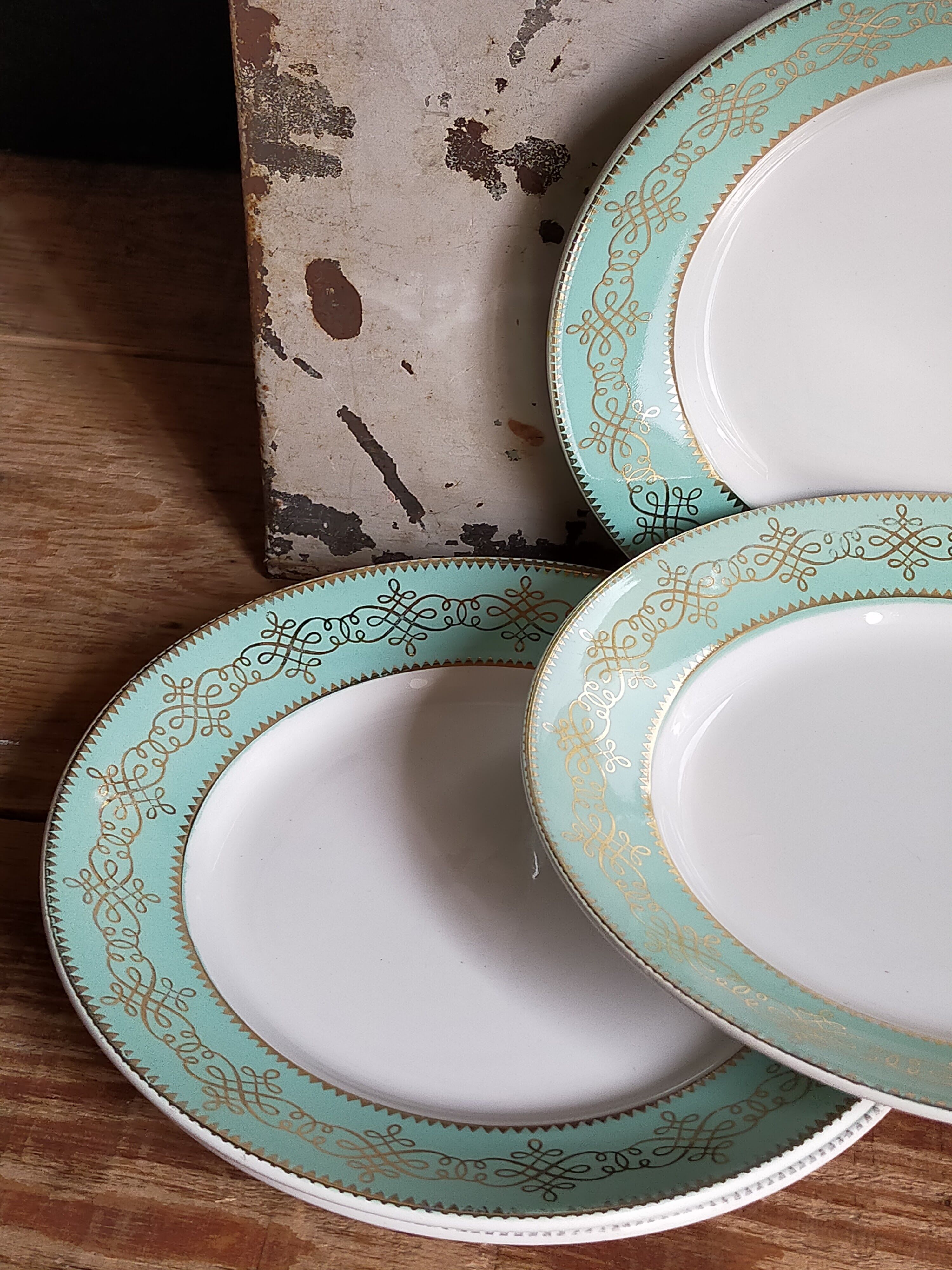 Six plates of vintage Badonviller earthenware with gold frieze
