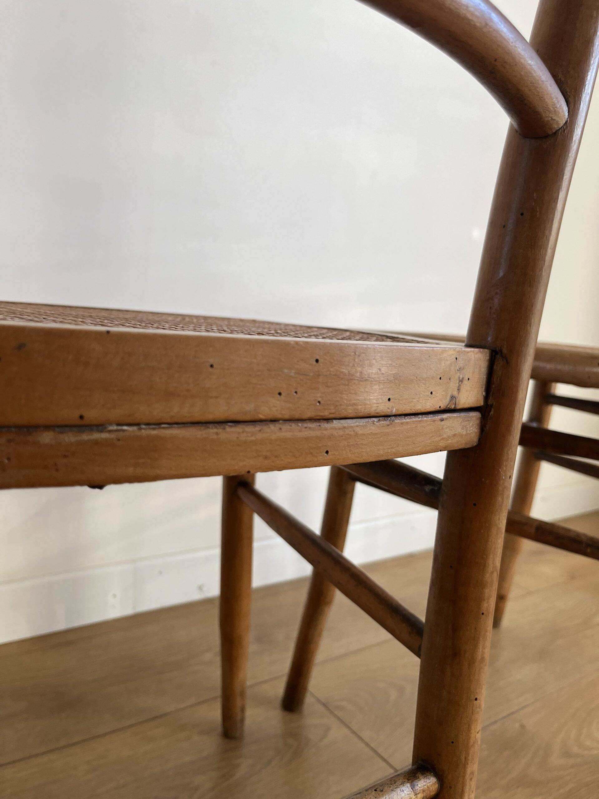 Pair of caned bistro chairs