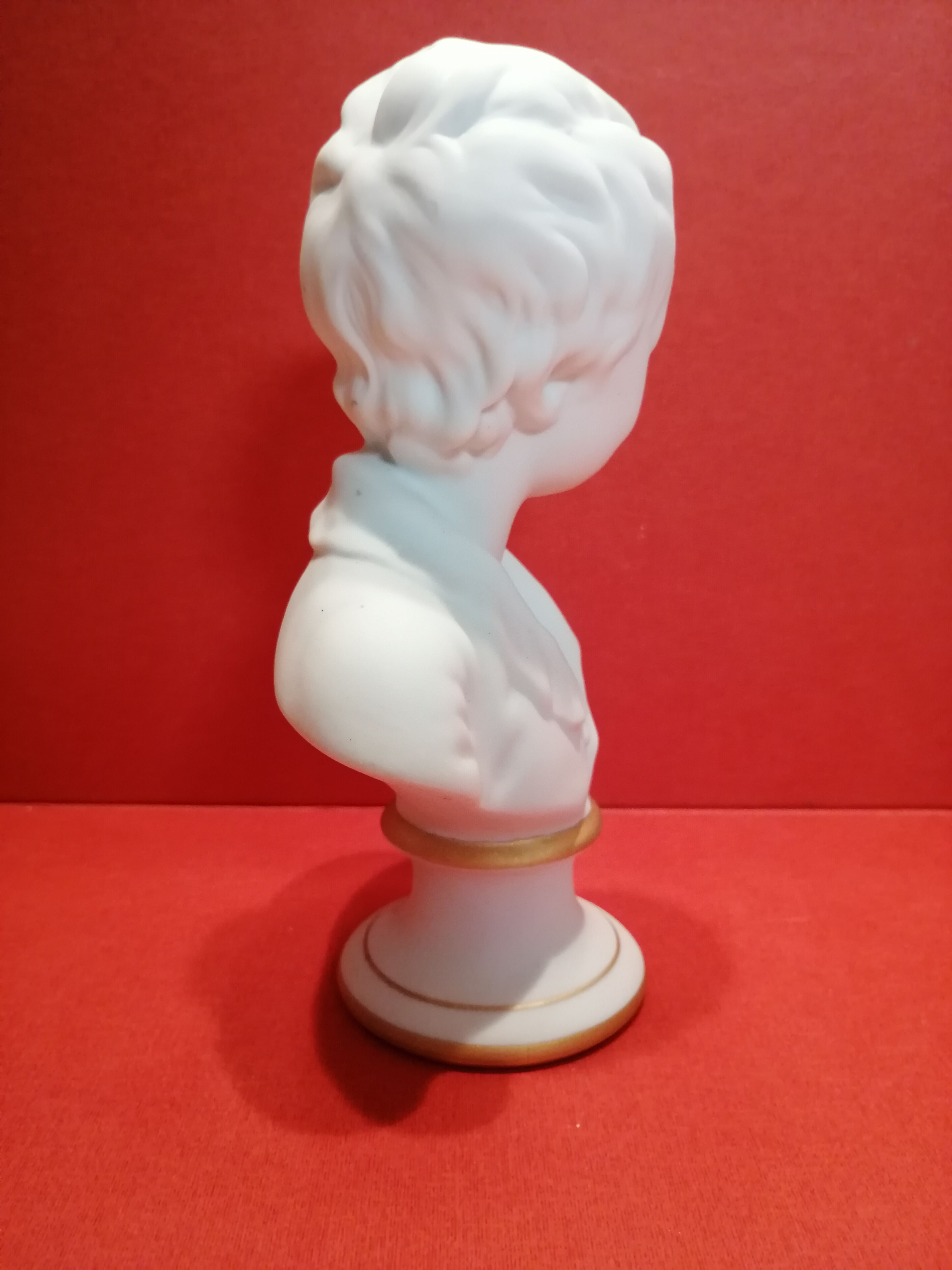 Small bust young boy in biscuit Tharaud Limoges