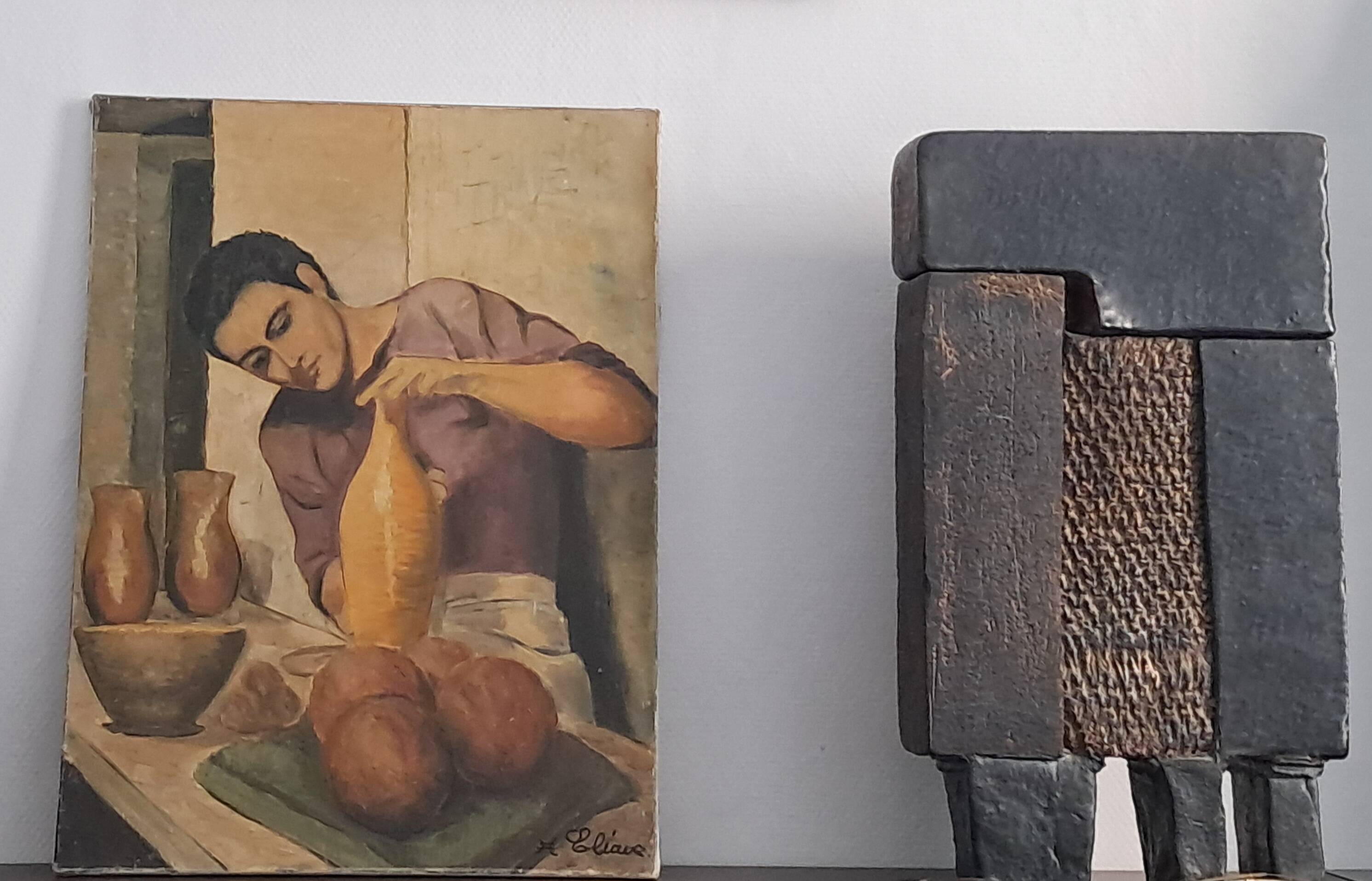 Figurative painting depicting a potter handling a large vase.