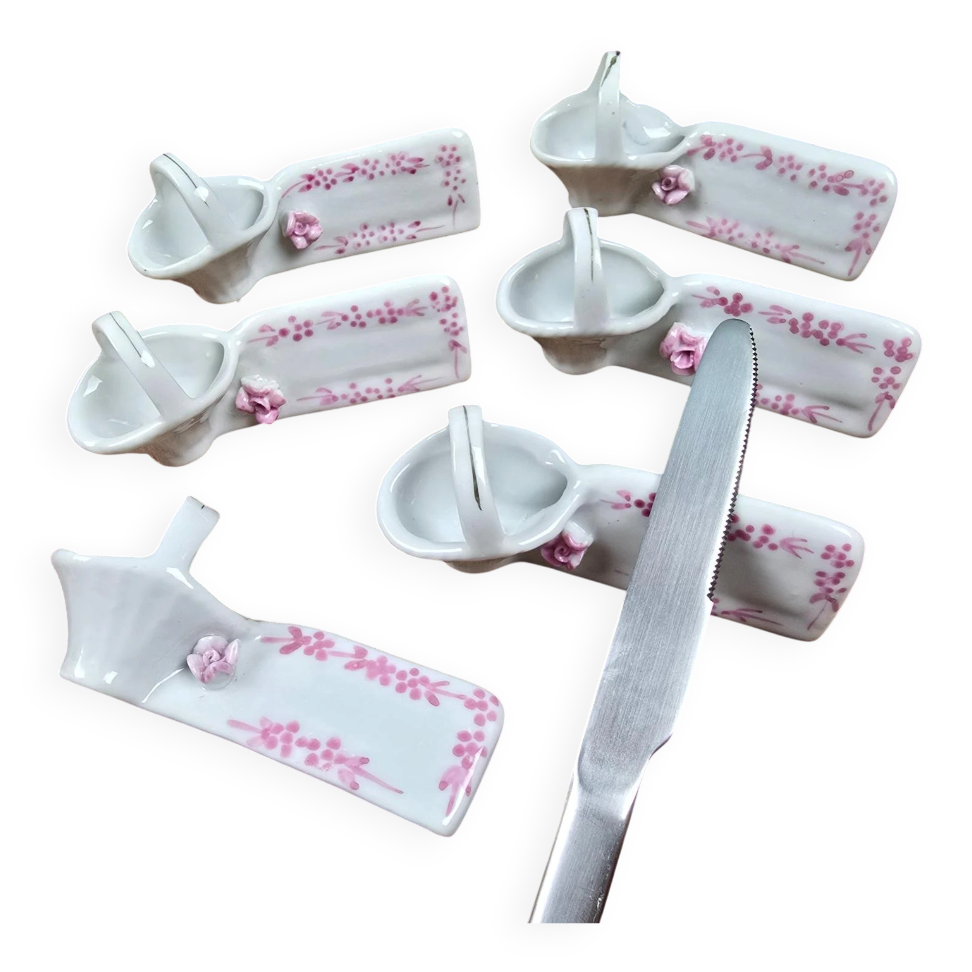 Set of 6 vintage porcelain knife rests with name markers, basket shape.