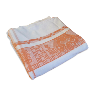 Old orange and white damask tablecloth