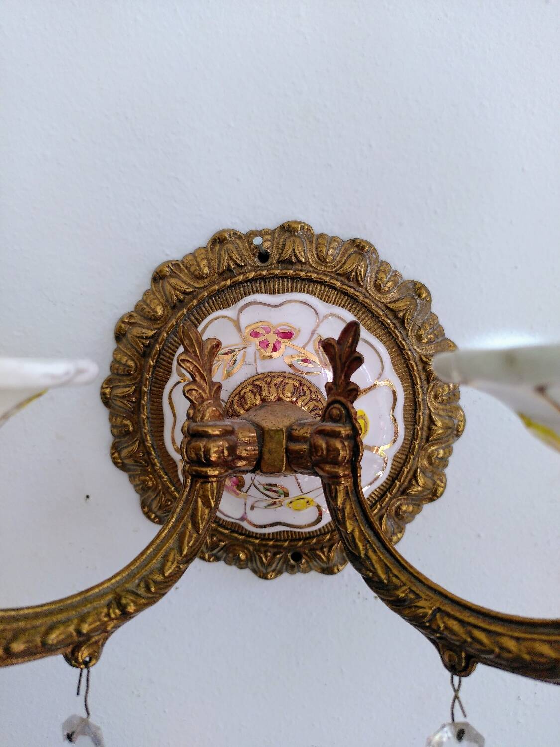 Pair of brass and porcelain wall lights