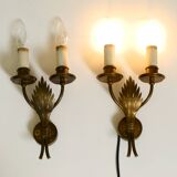 A pair of mid-century modern brass wall lamps by Vereinigte Werkstätten