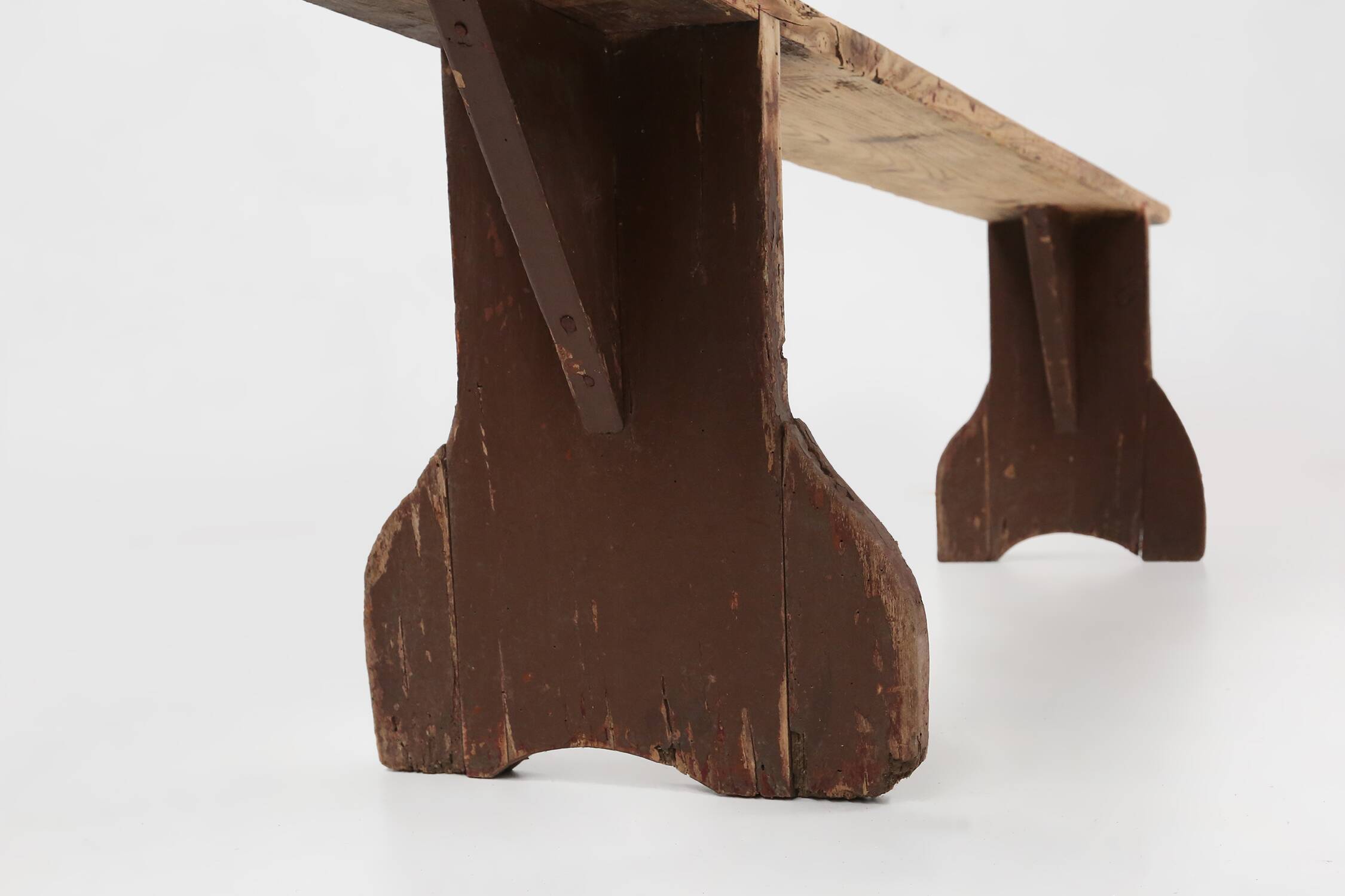 Rustic wooden bench in with brown painted feet, France ca. 1890