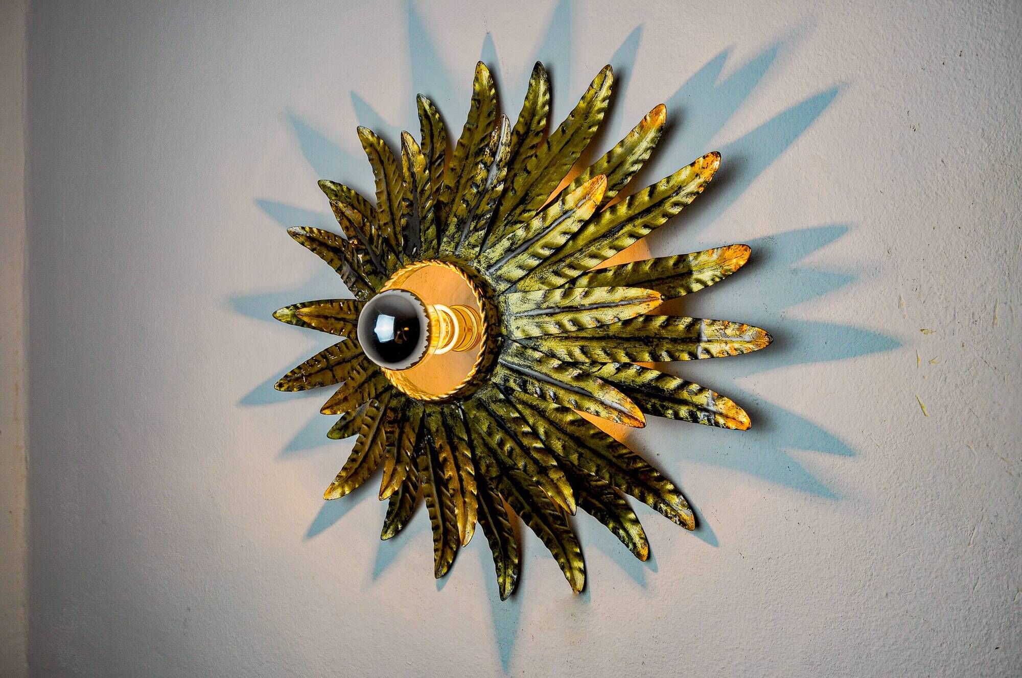 Sun wall lamp by Ferro Arte, metal and gold leaf, Spain 1970